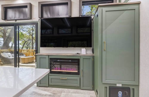 StarCrest Estates House | Travel Trailer at the Water w Easy Access, Hot Tub, Grill, 2-Tier Deck