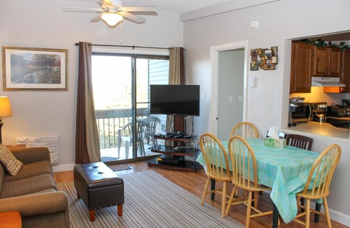 Weirs Beach Apartment | Tree Top Getaway