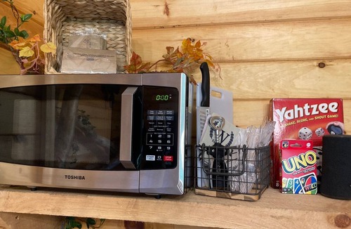 Nixa Cabin | Treehouse cabin-unique stay-convenient location yet very secluded atmosphere