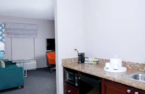 Wesley Chapel Hotel | Triple 2 Queen Studio w/Sofa Bed + Pool Access