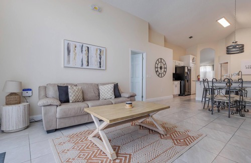 Lake Berkley Villa | Tropical Boho Lakefront Villa | Private Pool & Spa | Game Room | Near Disney