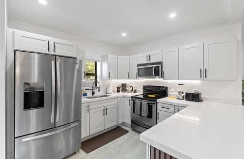 Central Oakland Park House | Tropical Getaway w Huge Yard! BNR Vacation Rentals