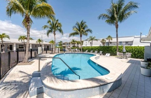Singer Island Apartment | "Tropical Oasis" by the beach & shops, with pool