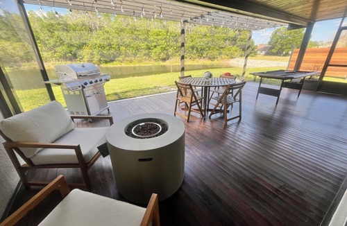 Meadow Pointe House | Tropical Retreat with Wildlife Lakeview- Pool Table, Gas Oven & Fire Pit