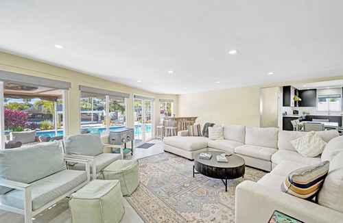 Garden Isles House | Tropical vacation retreat! Waterfront and Heated pool!