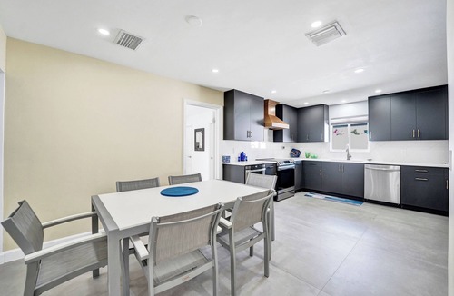 Garden Isles House | Tropical vacation retreat! Waterfront and Heated pool!
