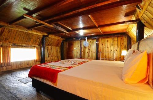 Ambarita House | Tuk Tuk Timbul Bungalows