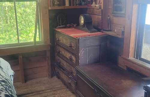 Forest CIty Cottage | Turn Of The Century Cabin On Private Island