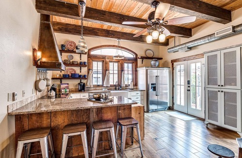 Eufaula Cottage | Tuscan feel with outdoor fireplace and cooking.