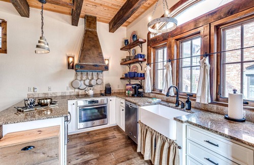 Eufaula Cottage | Tuscan feel with outdoor fireplace and cooking.