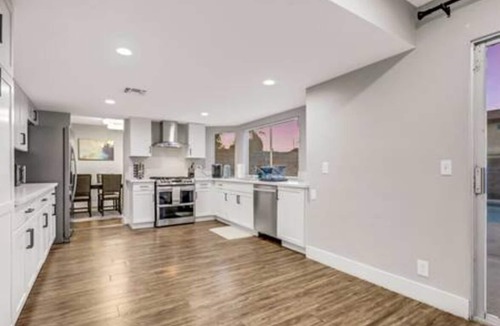 Chinatown House | TWAIN AVE · Modern Oasis: Heated Pool & Game Room