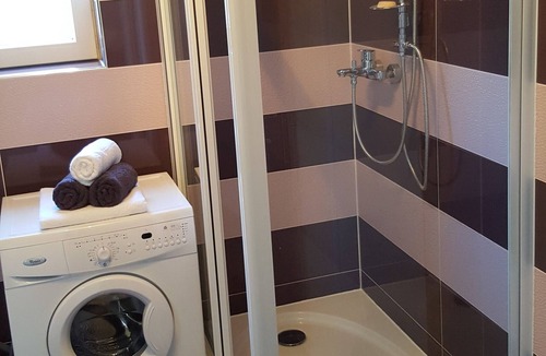 Strozanac Apartment | Two bedroom apartment with air-conditioning Podstrana, Split (A-13555-a)