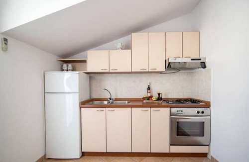 Supetar Apartment | Two bedroom apartment with a swimming pool Supetar, Brač (A-16774-b)