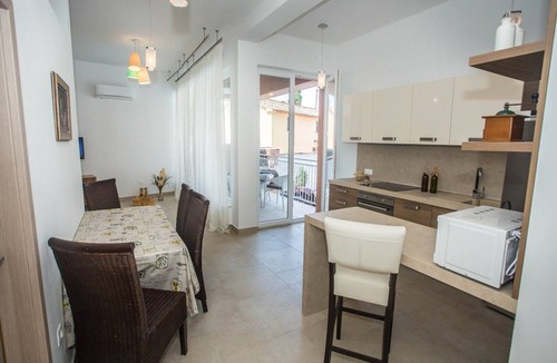 Tar Apartment | Two-Bedroom Apartment in Villa Valtrazza Noa IV with Balcony and Pool View