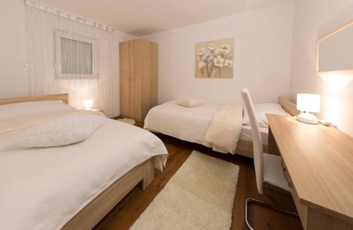 Otocac Apartment | Two bedroom apartment with terrace Otočac, Velebit (A-21951-a)