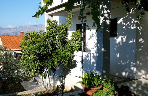 Postira Apartment | Two bedroom apartment with terrace and sea view Postira, Brač (A-2919-b)