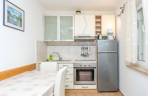 Postira Apartment | Two bedroom apartment with terrace and sea view Postira, Brač (A-2948-b)