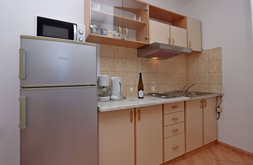 Lopar Apartment | Two bedroom apartment with terrace and sea view Lopar, Rab (A-21808-a)