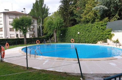 Jaca Apartment | Two-Bedroom Apartment with Pool, Balcony, and Garage in Tranquil Jaca