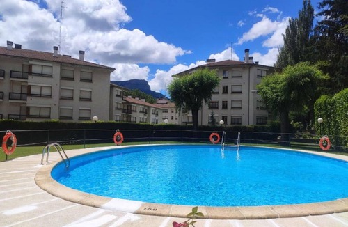Jaca Apartment | Two-Bedroom Apartment with Pool, Balcony, and Garage in Tranquil Jaca