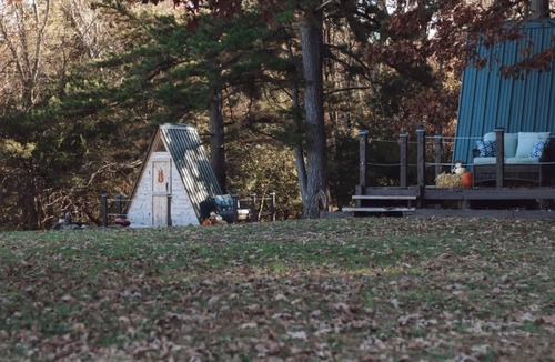 Kingston RV Rental | Two cozy pods with water tower