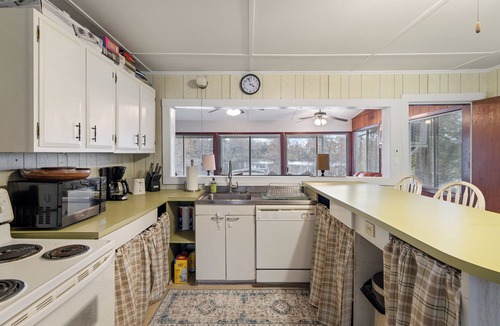 Acme House | TWO homes on Black River Lake with TWO boat slips!