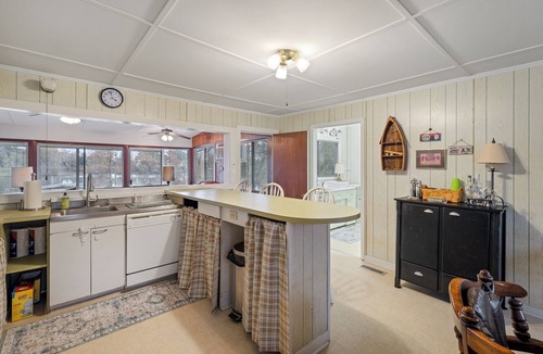 Acme House | TWO homes on Black River Lake with TWO boat slips!