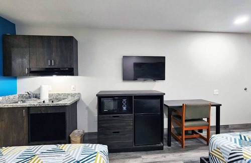 Wharton Hotel | Two Queen Beds Kitchenette Non-Smoking Room at Scottish Inns and Suites!