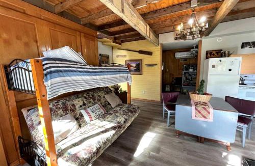 Marble Falls House | Two-Story Cabin Rental for Large Groups along Hamilton Creek in Marble Falls, Texas