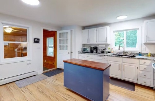 Alton Bay House | Two updated lakefront homes - dock with boat slip, game room, & screened porch