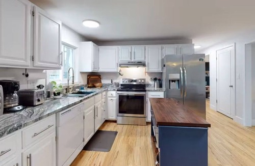Alton Bay House | Two updated lakefront homes - dock with boat slip, game room, & screened porch