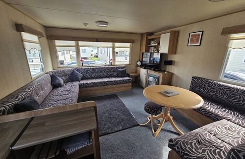 Towyn Ski Chalet | Ty Mawr Chalet Sleeps 6 with Fireplace