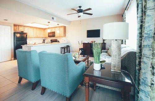 Orange Lake Villa | Ultimate Family & Business Getaway: Spacious 2BR villa, pool, golf, & much more.