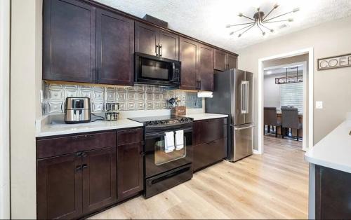 Columbus House | Ultimate Getaway with Pool and Games