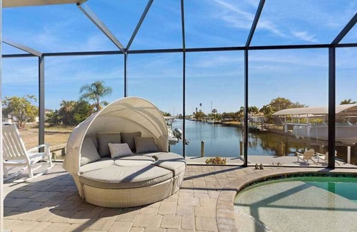 Edgewater House | Ultimate waterside retreat with private dock, lanai, pool & spa, BBQ and WiFi