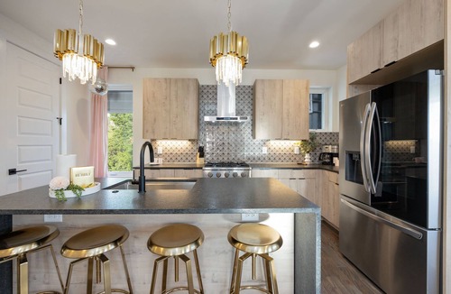 Katie Hill Neighborhood House | Ultra Heated Rooftop Pool! Arcade, Elevator, EV Charger, Sleeps 12, Full Home