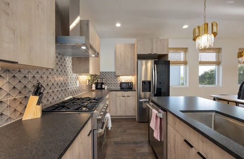Katie Hill Neighborhood House | Ultra Heated Rooftop Pool! Arcade, Elevator, EV Charger, Sleeps 12, Full Home