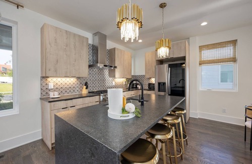 Katie Hill Neighborhood House | Ultra Heated Rooftop Pool! Arcade, Elevator, EV Charger, Sleeps 12, Full Home