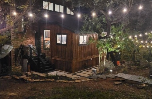 Comanche Trail House | Unbelievable 3 1/2 story Modern Cabin with Lake View
