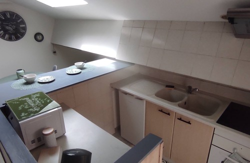 Le Bourg Apartment | Under the roof