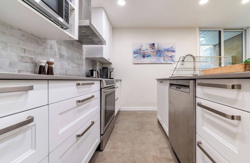 Shaughnessy Village Apartment | une retraite de qualité au niveau du jardin en centre-ville