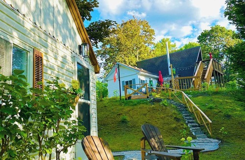 Plympton-Wyoming Cottage | Unique A-frame retreat right on the river and steps to the beach.