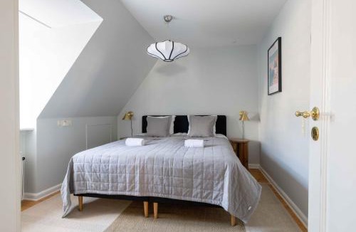 Copenhagen City Centre Apartment | Unique Apartment w Exposed Beams Next to Tivoli