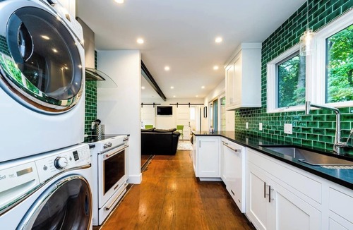 Benton Harbor Apartment | Unique container home retreat near Lake Michigan. Enjoy a peaceful, private setting with a spacious deck, firepit, and ravine views. Close to beaches, wineries, and downtown St. Joseph—perfect for a relaxing Southwest Michigan getaway.