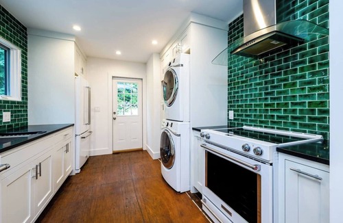 Benton Harbor Apartment | Unique container home retreat near Lake Michigan. Enjoy a peaceful, private setting with a spacious deck, firepit, and ravine views. Close to beaches, wineries, and downtown St. Joseph—perfect for a relaxing Southwest Michigan getaway.