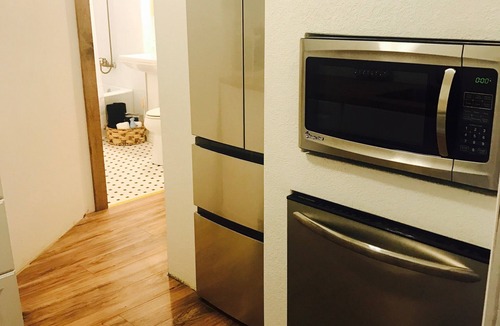 City Park West Apartment | Unique , contemporary with HOT TUB!