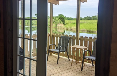 Jasonville Cabin | Unique cozy 14x40 Cabin with a nice deck by the water .