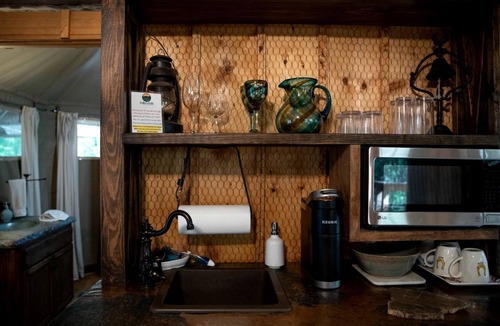 Dennis RV Rental | Unique Four-Person Luxury Tent with a Waterfall near Fort Worth, Texas