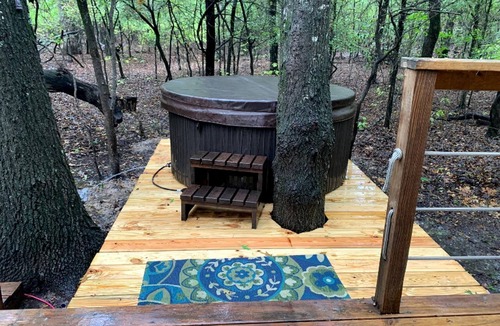 Dennis RV Rental | Unique Four-Person Luxury Tent with a Waterfall near Fort Worth, Texas