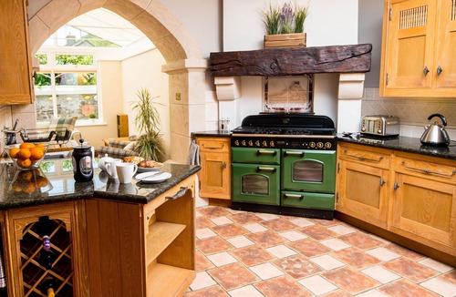 Llanddowror Cottage | Unique historic school‑house conversion with log burner